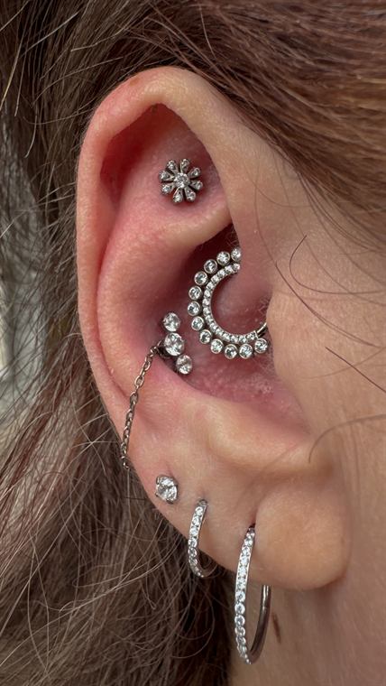 Curadoria de orelha em prata